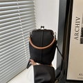 Black canvas mini crossbody bag with orange handle and vintage clasp closure - Black