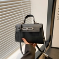 Minimalist black structured handbag with textured PU leather and silver metal buckle detail - Black