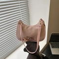 Pink crescent shoulder bag with metallic bow detail and textured fabric finish - Pink