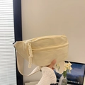 Cream-colored nylon crossbody chest bag with adjustable wide strap and cord zipper detail - Off White