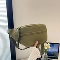 Olive green cross-body chest bag with durable nylon fabric and wide shoulder strap - Green