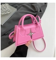 Schicke pinke Handtasche mit silberner Sternschnalle und abnehmbarem Schultergurt - Rosa