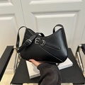 Minimalist black leather underarm saddle bag with stylish silver metal buckle detail - Black
