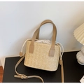 Natural straw handbag with brown leather straps and white drawstring liner in beige - Khaki