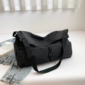 Minimalist black multi-functional sports gym bag with dual front pockets and wide shoulder strap - Black