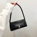 Borsa baguette classica in pelle nera con chiusura in metallo dorato per l'estate 2025 - Nero