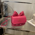 Mini-Mädchenumhängetasche in Pink mit großer Schleife und weißen Pünktchen-Details - Rosenrosa