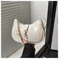 Detail of white leather hobo bag featuring a gold lobster clasp and fine U-shape stitching - White