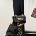 Mini black woven leather crossbody bag with gold twist lock and chain strap - Black