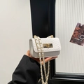 Mini white woven chain bag with gold rectangular clasp and elegant crossbody strap - White