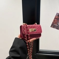 Mini dark red woven leather crossbody bag with gold chain and metal turn-lock closure - Red