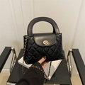 Elegant black quilted handbag with round handle and gold chain shoulder strap - Black