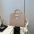 Elegant beige tote bag with crocodile texture pattern and round gold metal handle - Khaki