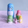 Handcrafted 5-piece wooden nesting dolls with colorful cartoon owl painted designs - Light Blue