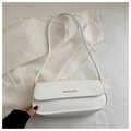 Detail of white leather shoulder bag featuring gold 'FASHION & BAGS' text and metal hardware - White