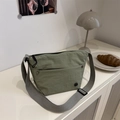 Green lightweight crossbody bag with adjustable wide strap and front button pocket - Green