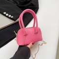 Fuchsia mini schelptas van generfd leer met gouden ketting en dubbele handgrepen - Roze