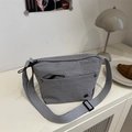 Light grey lightweight nylon crossbody bag with wide shoulder strap and metal logo - Gray