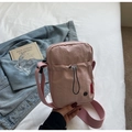 Pink nylon crossbody bag with drawstring detail and wide strap for casual spring style - Pink