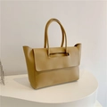 Detail view of the beige tote bag with a minimalist flap cover and sturdy double handles - Khaki