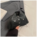 Detail of unique black jacket-shaped crossbody bag with silver buttons and chain strap - Black