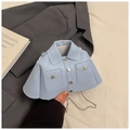 Close-up of light blue jacket-shaped mini bag with silver chain and metal buttons - Blue