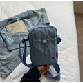 Chic foggy blue nylon crossbody bag with drawstring pocket and adjustable strap - Blue