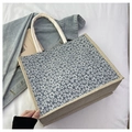 Floral print rectangular linen tote bag with sturdy white rope handles and canvas edges - Blue
