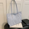 Light blue large capacity tote bag with textured crinkle finish and gold rivet details - Blue