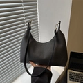 Minimalist black hobo shoulder bag with twill texture and gold hardware details - Black