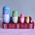 5-piece colorful cartoon owl wooden nesting dolls set arranged on a vintage red book spine - Blue Owl Style (TW-SG0509)