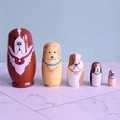 Detail of five-piece wooden nesting dolls featuring various hand-painted dog breeds - Brown Dog Style (TW-SG0504)