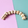 Set of 10 natural wooden acorns for DIY crafts and Nordic home decor on bicolor background - Acorn Shape