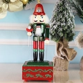 European nutcracker music box in green uniform on a red square base for Christmas decor - Square Box Fencing Nutcracker