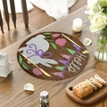 Close-up of a round linen placemat with an Easter bunny and tulip pattern design - Rabbit and Tulips (CDE1-1)
