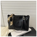 Detail of black tote bag with white stitching and decorative vintage floral scarf - Black