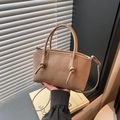 Chic beige faux leather tote bag with FASHION embossing and adjustable crossbody strap - Khaki