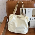 Off-white corduroy tote bag with brown handles and central leather fashion label - Off-white