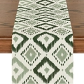 Green and cream geometric ikat pattern table runner on a dark wood dining table - Green Geometric Ikat Style (ZQ19-1) / 33X180cm