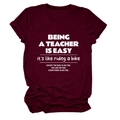 Detail of burgundy teacher slogan t-shirt with white screen-printed lettering texture - Wine Red (White Font)
