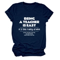 Detail of navy blue cotton T-shirt featuring 'Being a Teacher is Easy' slogan print - Navy Blue (White Font)