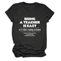 Detailed close-up of dark grey teacher slogan cotton t-shirt with white humor text - Heater Grey (White Font)