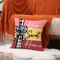 Pink and yellow striped decorative pillowcase with Home Sweet Home text and bow design - Home Sweet Home Style