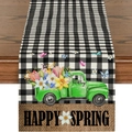 Detail eines Happy Spring Tischläufers mit grünem LKW-Motiv auf dunklem Holztisch - Frühling Blumen Schmetterling Grüner LKW Stil (ZQ28-6)