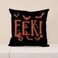 Halloween kussensloop in zwart met oranje EEK tekst en griezelige spookhuis iconen - EEK Letters Stijl (CRW02-3)