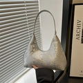 Chic silver snake-print hobo bag with sleek metallic finish and shoulder strap - Silver