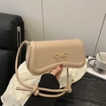 Chic beige bow design crossbody bag with golden metal buckle and knot strap detail - Khaki