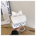 Cream white crossbody bag with large bow and black polka dot pattern on the base - White