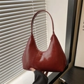 Minimalist burgundy crescent hobo shoulder bag in glossy leather with fashion embossing - Red