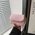 Mini pink polka dot crossbody bag for women with flap cover and thin shoulder strap - Pink